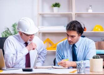 Obraz premium Two architects working on the project