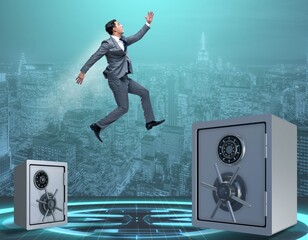 Businessman jumping from safes in business concept
