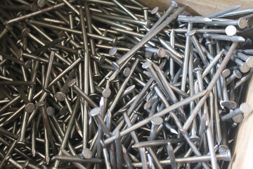 a collection of many iron nails in a building shop