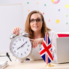 Female english language teacher in time management concept