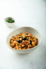 Homemade pasta puttanesca with fresh parsley