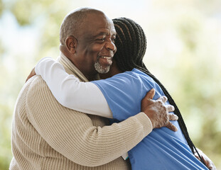 Senior man, caregiver and hug for support, healthcare and happiness at retirement home. Happy...