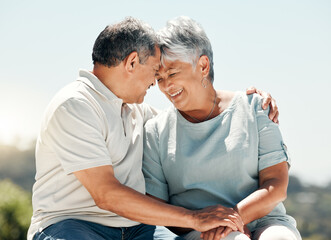 Senior couple, intimate and smile in nature on vacation, holiday or summer bonding. Hug, love and...