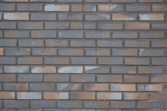 View of the dark brick wall, texture
