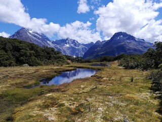Fototapeta na wymiar Scenery view on mountains with reflection on lake, Southland, New Zealand