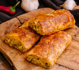 Vertuta or placinta with cottage cheese on wooden board