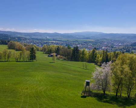 Czech landscape with city Hronov in background and huge mountains