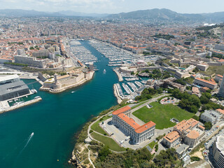 Aerial top down drone image of the port of Marseille and city center.