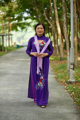 Vietnamese senior woman in the park.
