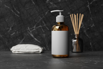 blank amber glass pump bottle mockup in bathroom background