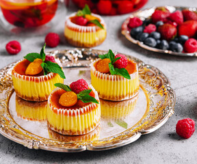 Mini cheesecake with apricot in muffin forms