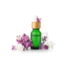 Plakat Bottles of cosmetic oil with beautiful lilac flowers on white background