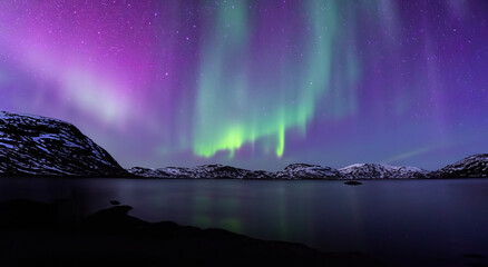 beautiful northern lights seen from iceland at night