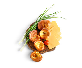 Wooden board with tasty Yorkshire pudding and cheese isolated on white background