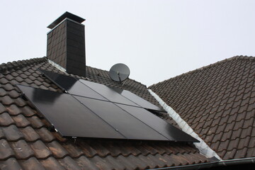 roof tiles and chimney and photovoltaic 