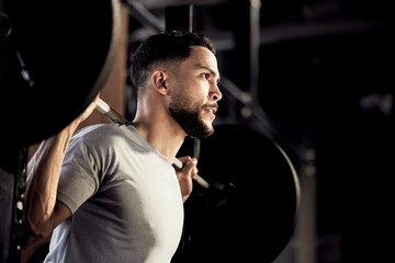Weightlifting, barbell and workout with man in gym for exercise, strong and muscle. Training, focus and challenge with male bodybuilder in fitness center for health, performance and power