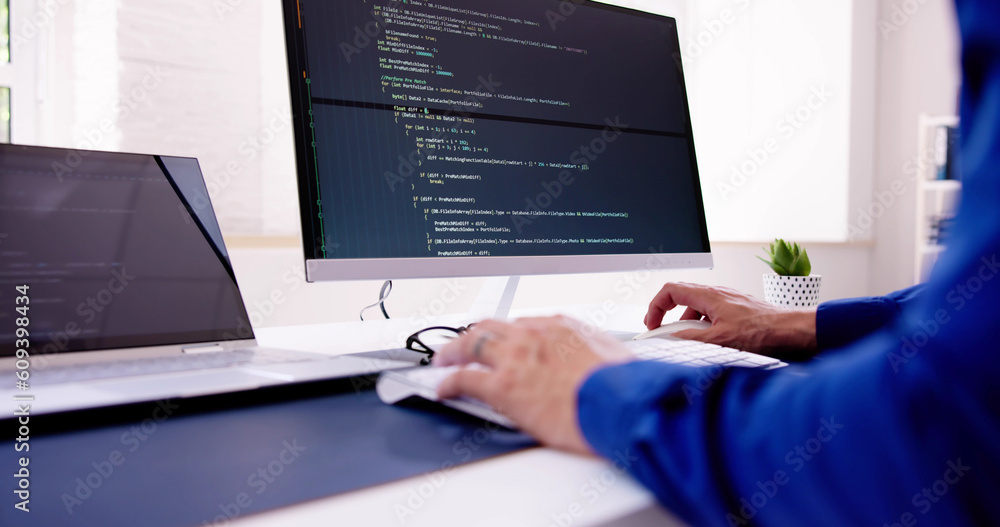 Fototapete Computer Programmer Writing Program Code On Computer