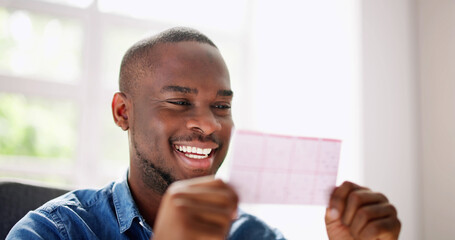 African Man Kissing Gamble Ticket