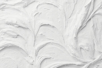 Decorative white putty background. Wall texture with filler paste applied with spatula, chaotic...