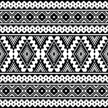 Geometric seamless tribal pattern with ethnic Aztec motives in black and white. Abstract background in ethnic style. Design for textile, fabric, clothes, curtain, carpet, batik, ornament, wallpaper.