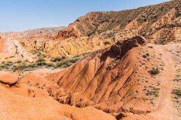 Fototapeta na wymiar Skazka (Fairytale) Canyon - the most unusual and picturesque gorge on the southern shore of Issyk-Kul, the main attraction in the vicinity of the lake, Kyrgyzstan
