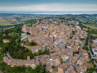 Obraz premium Italy, June 02, 2023: aerial view of the beautiful medieval village of Potenza Picena. The village is located on the Marche hills in the province of Macerata