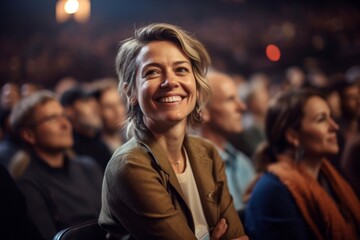 Fototapeta premium Portrait of a senior businesswoman standing in front of a crowd