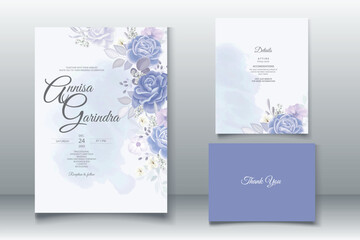 Naklejka na ściany i meble Elegant wedding invitation card with beautiful blue floral and leaves template Premium Vector