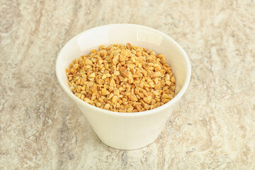 Crunched roasted peanut in the bowl