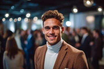 Fototapeta premium Medium shot portrait photography of a satisfied man in his 20s that is wearing a chic cardigan against a charity gala event with auction and celebrities background . Generative AI