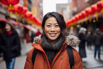 Portrait of a beautiful asian woman traveling in china town