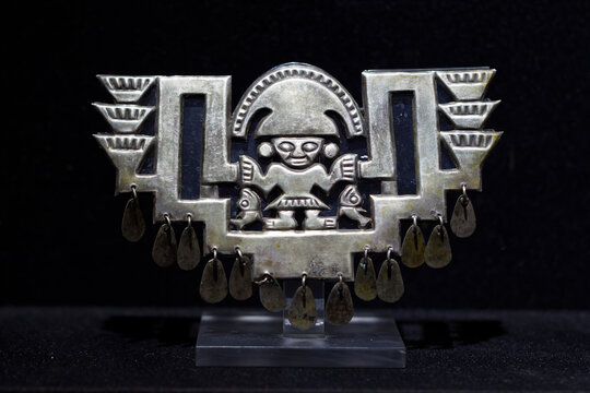Lima, Peru, June 03 2023 : silver Chimu (Chim&uacute;) artifact (nose ornament) on display in the Museo Larco (Larco museum).