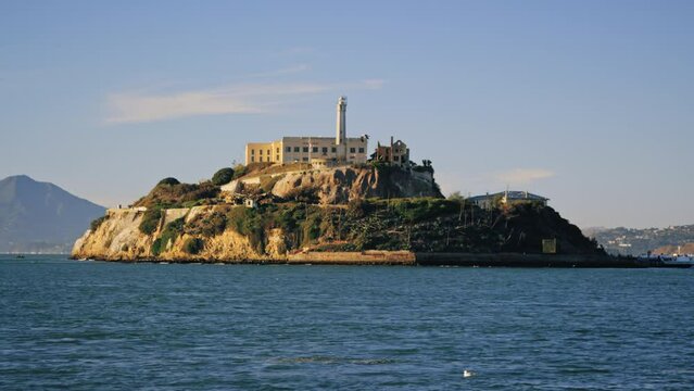 South side of Alcatraz Island in San Francisco Bay on bright clear afternoon
