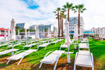 Tourist resort chaise lounges . Perfect tropical vacation 