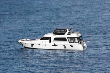 Fototapeta na wymiar Motor speed boat yacht at open sea