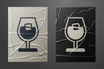 White Wine glass icon isolated on crumpled paper background. Wineglass sign. Paper art style. Vector