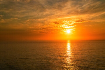 Gorgeous panorama scenic strong sunrise cloud on orange sky.