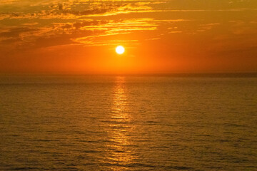 Gorgeous panorama scenic strong sunrise cloud on orange sky.