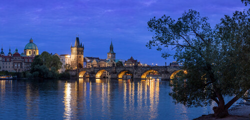 Prague: View to the Stare Mesto old city area with charles bridge and eastern bridge tower during...