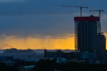 Fototapeta na wymiar construction site at sunset