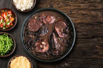 Feijoada typical Brazilian food. Traditional Brazilian food made with black beans. top view - 609452206