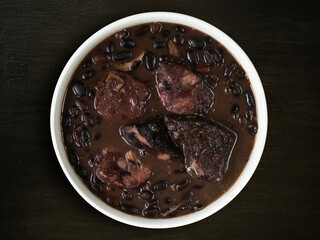 Detail of Feijoada typical Brazilian food. Traditional Brazilian food made with black beans.