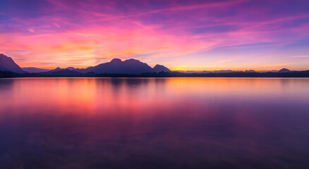 beautiful landscape of a sunset with purple colors