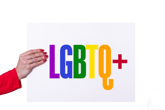 Woman hand holding a LBGBTQ+ white poster on transparent background. Studio shot.