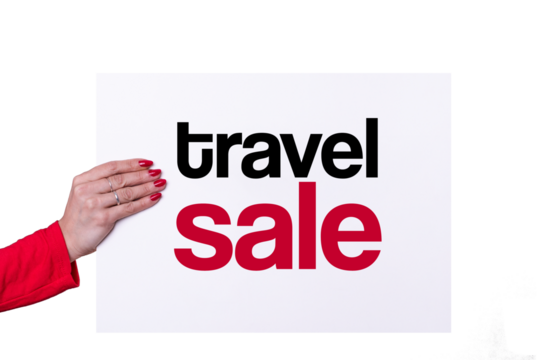 Woman hand holding a TRAVEL SALE white poster on transparent background. Studio shot. Commercial concept.