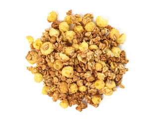 Muesli breakfast cereal on a white background. Healthy organic granola. Granola with nuts and raisins. dry muesli with oatmeal, nuts and corn balls top view.