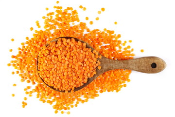 Pile red lentils isolated on white, top view 
