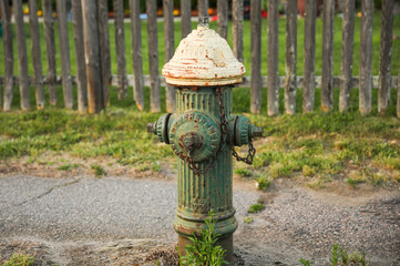 Fototapeta na wymiar Fire hydrants symbolize safety, emergency response, and firefighting. They represent preparedness, the presence of water supply for firefighting purposes, and the importance of public safety
