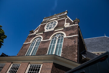 Fototapeta na wymiar Northern church (Noorderkerk, 1620 - 1623) - 17th-century Protestant church in Jordaan neighborhood along Prinsengracht canal. Amsterdam, the Netherlands.