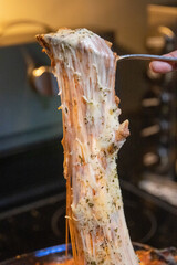 Fork of extremely cheesy backed ziti